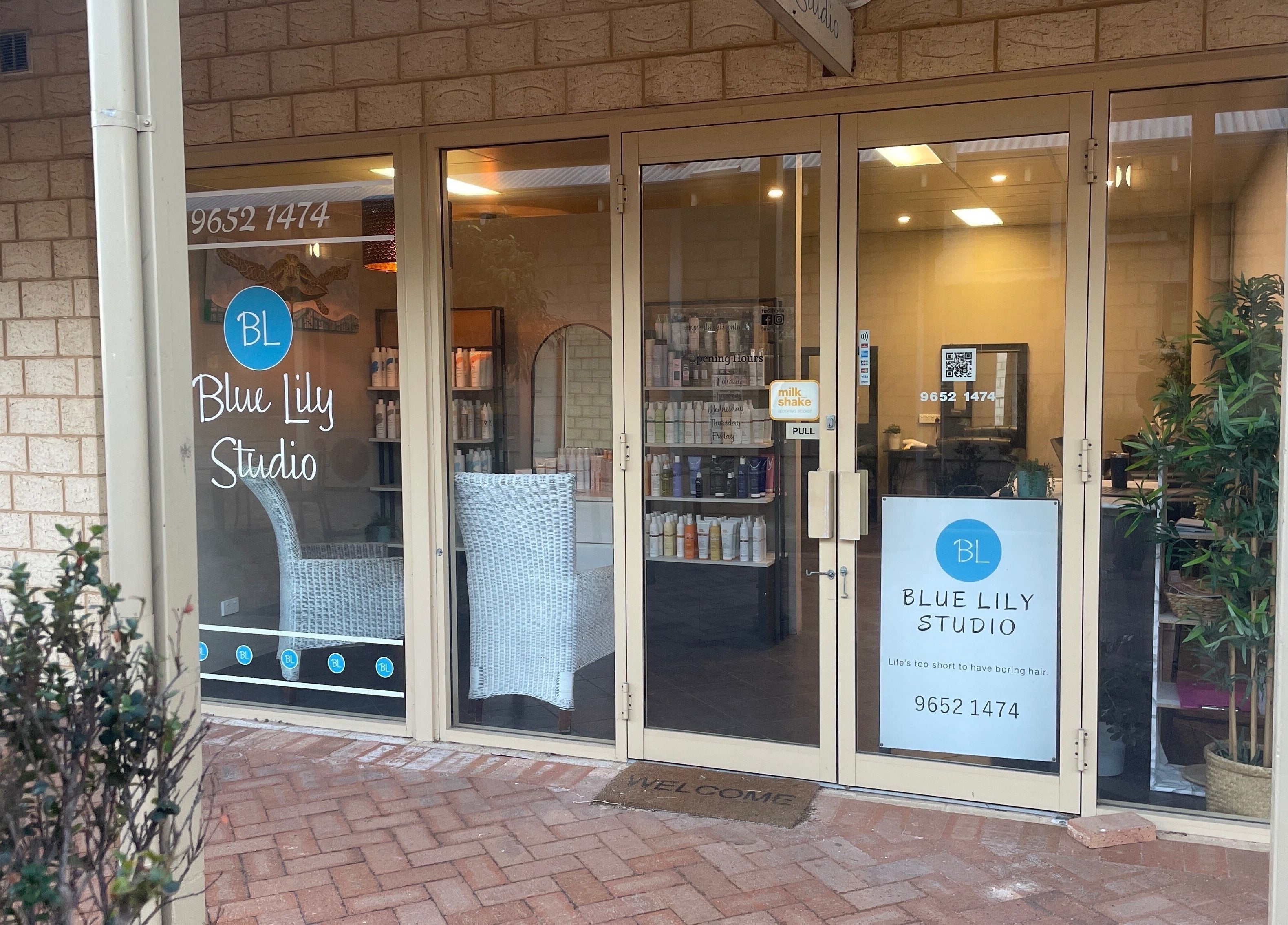 Entrance of Blue Lily Studio in Jurien Bay, Western Australia, showcasing inviting decor and signage.
