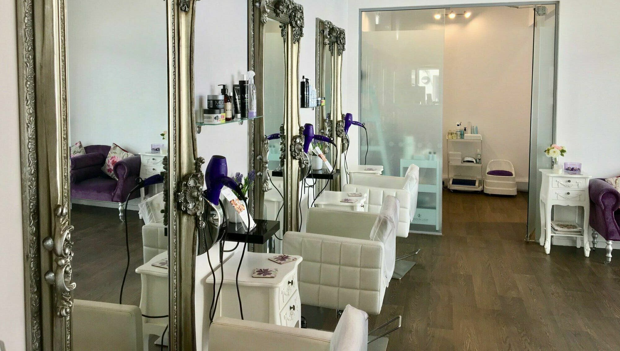 Luxurious salon interior with ornate mirrors at Hair, Brackley, England, GB.