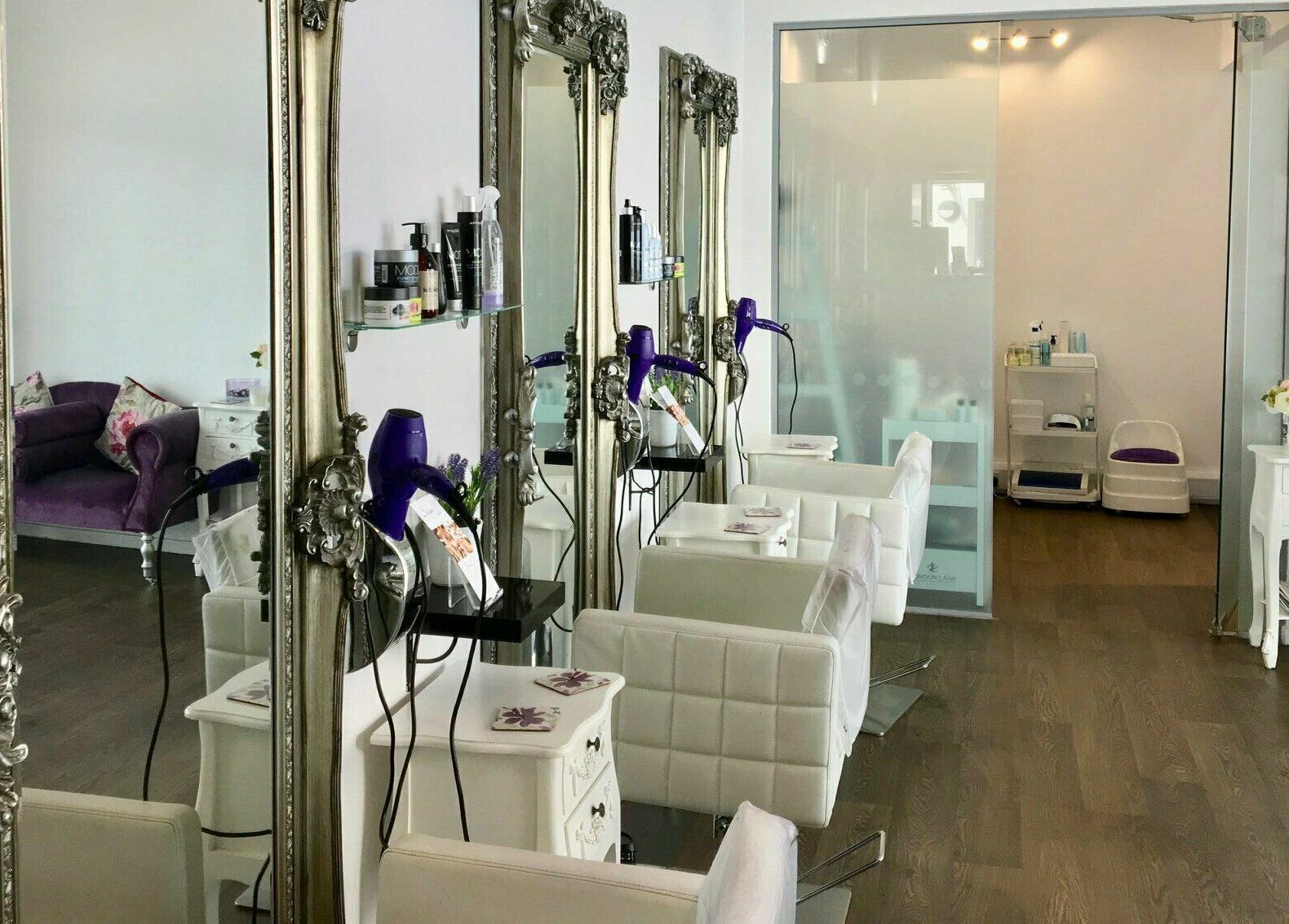 Luxurious salon interior with ornate mirrors at Hair, Brackley, England, GB.