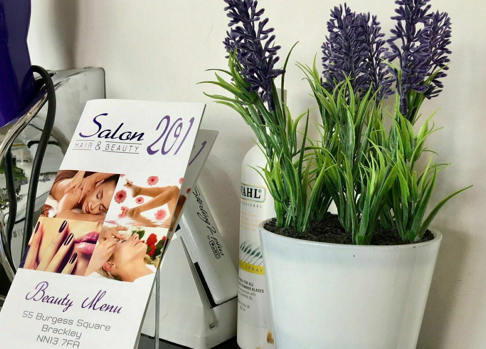 Hair beauty menu and decor in Brackley, England, GB, showcasing salon elegance.