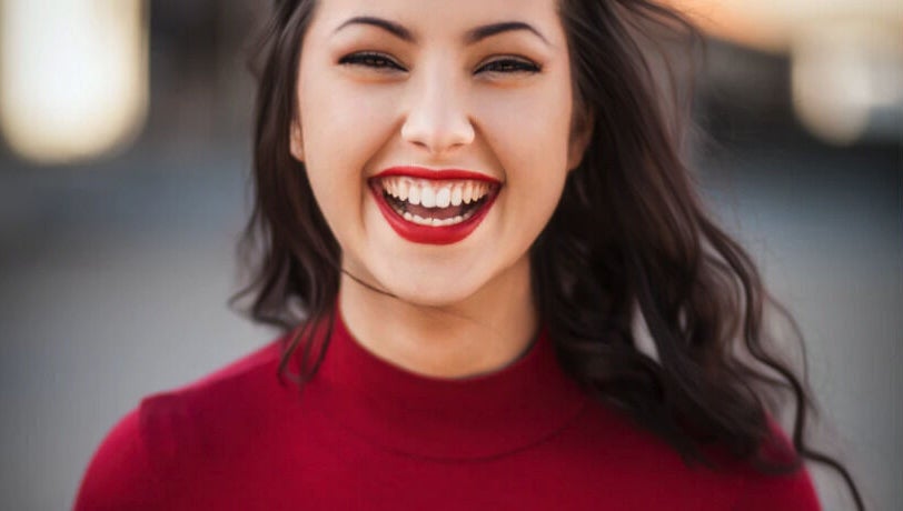 Bright smile showcased by Advanced Smile Lab Cosmetic Teeth Whitening in Taylor, Michigan, US.