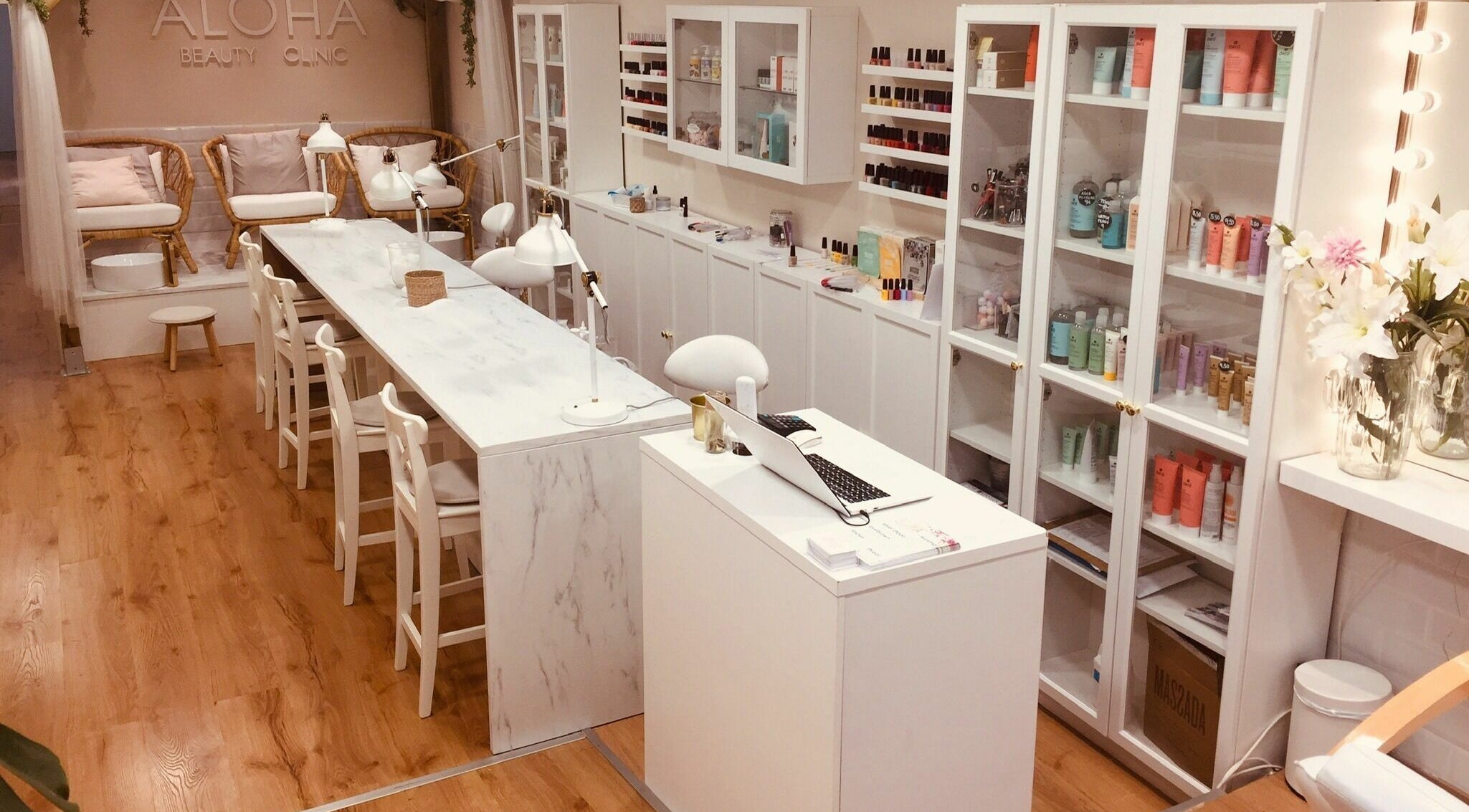 Aloha Beauty Clinic Poblenou interior with white decor and beauty products in Barcelona, Catalunya, ES.
