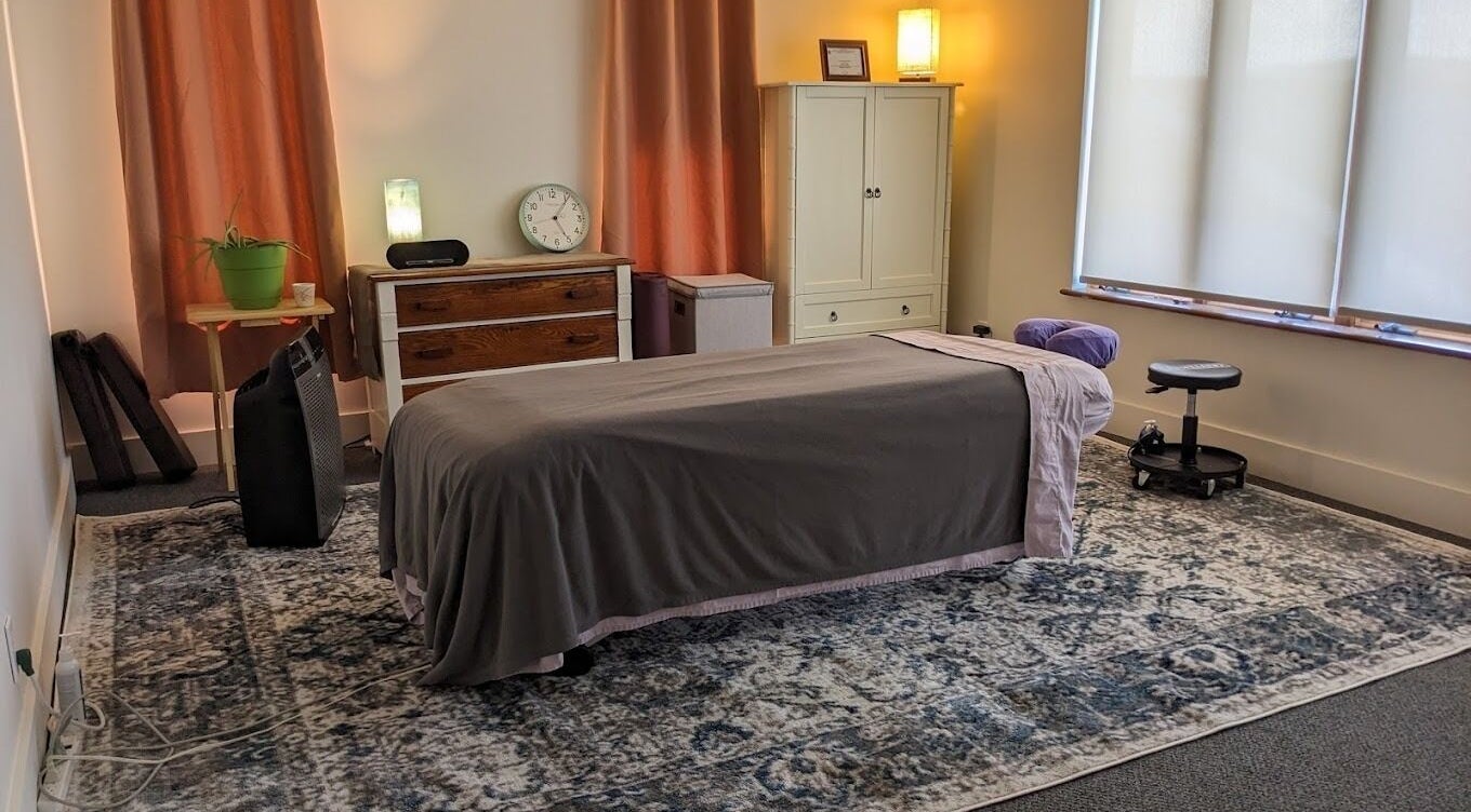 Inviting massage room at Leila M Percy Massage, Rockland, Maine, US, featuring a comfortable massage table.