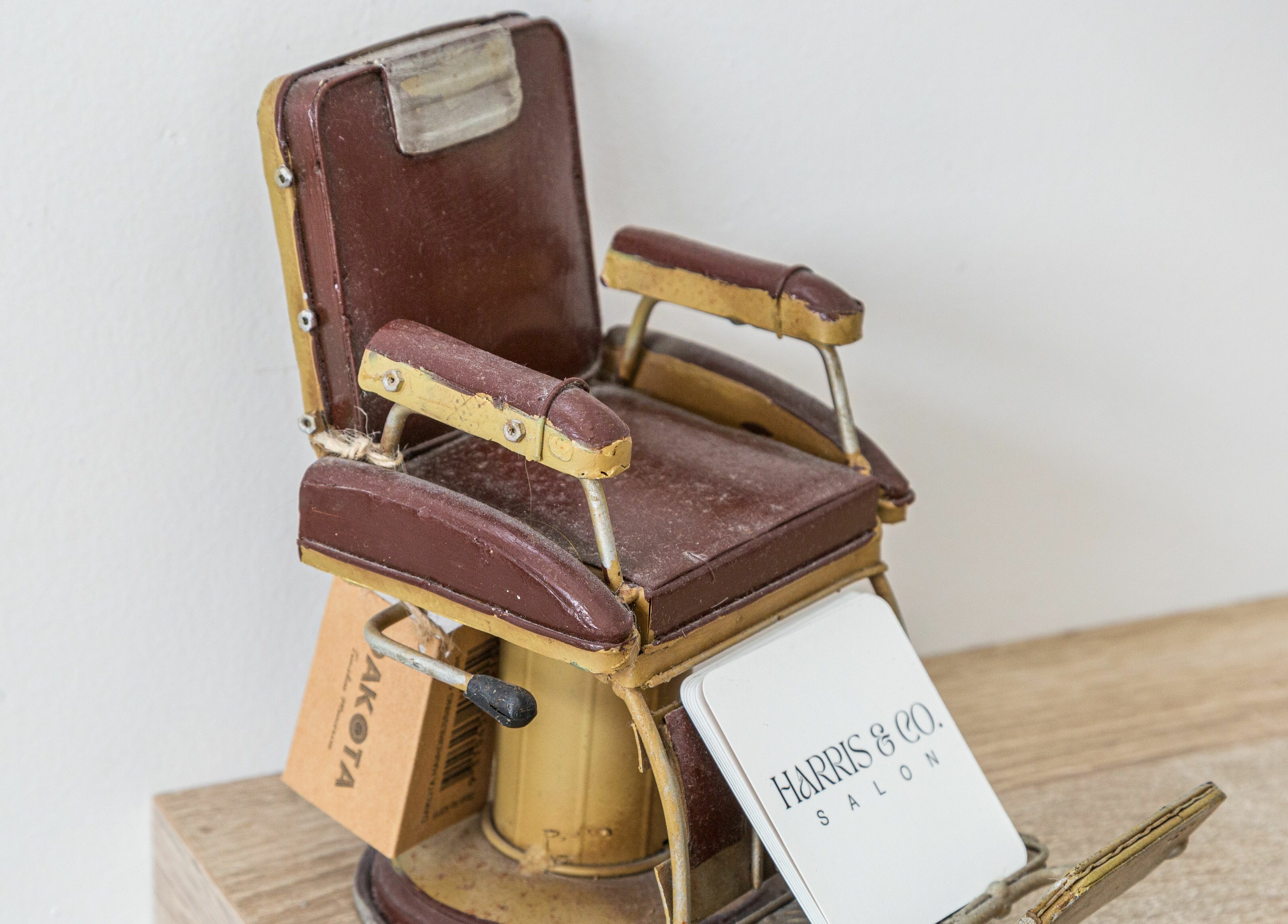 Vintage barber chair at Harris and Co. in Burleigh Heads, Queensland, AU, showcasing classic salon design.