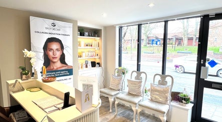 Elegant reception area at Pro Level Beauty, Malton, England, GB with modern chairs and beauty products display.