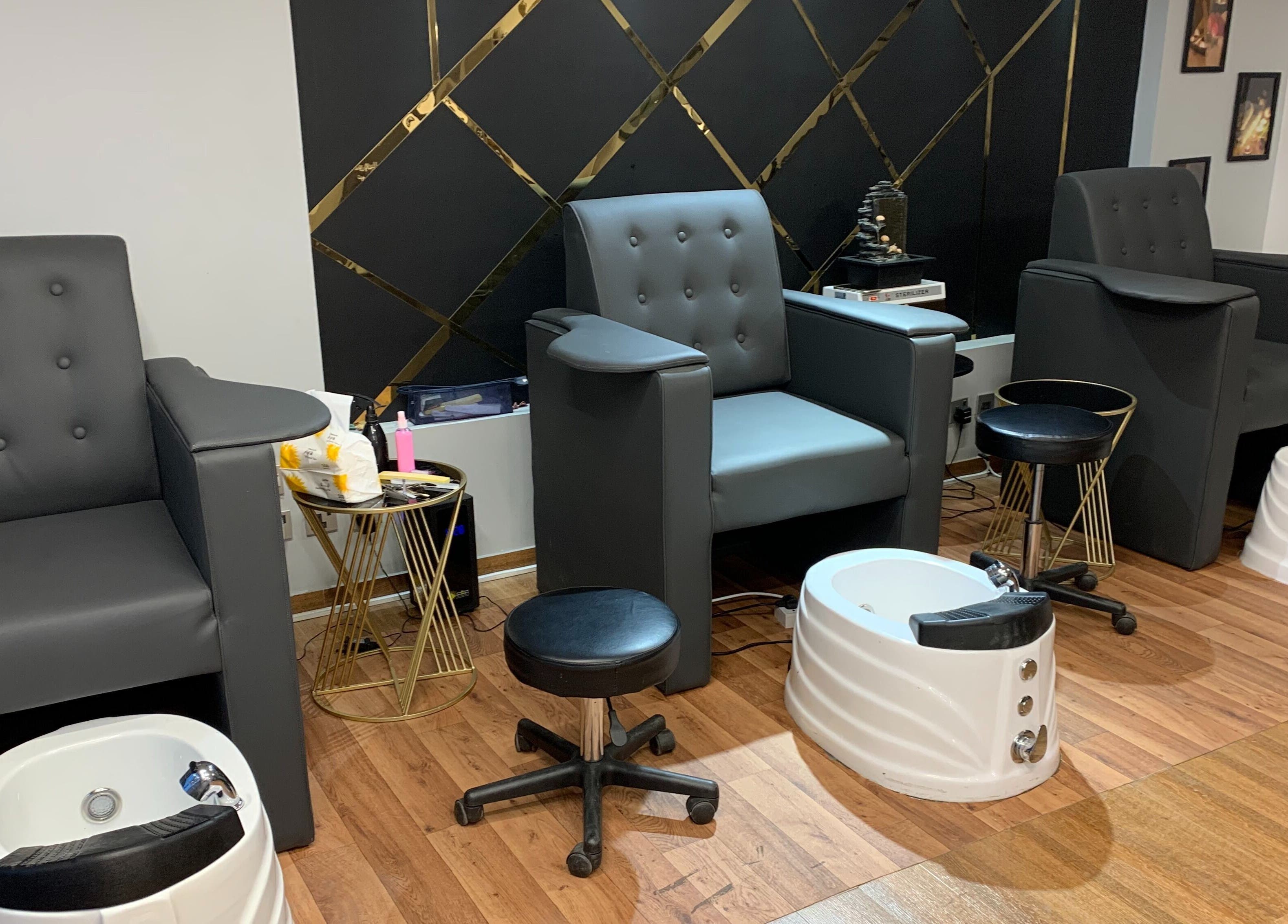 Comfortable pedicure chairs at White Bamboo in Jeddah, Makkah Province, SA showcasing luxury and style.