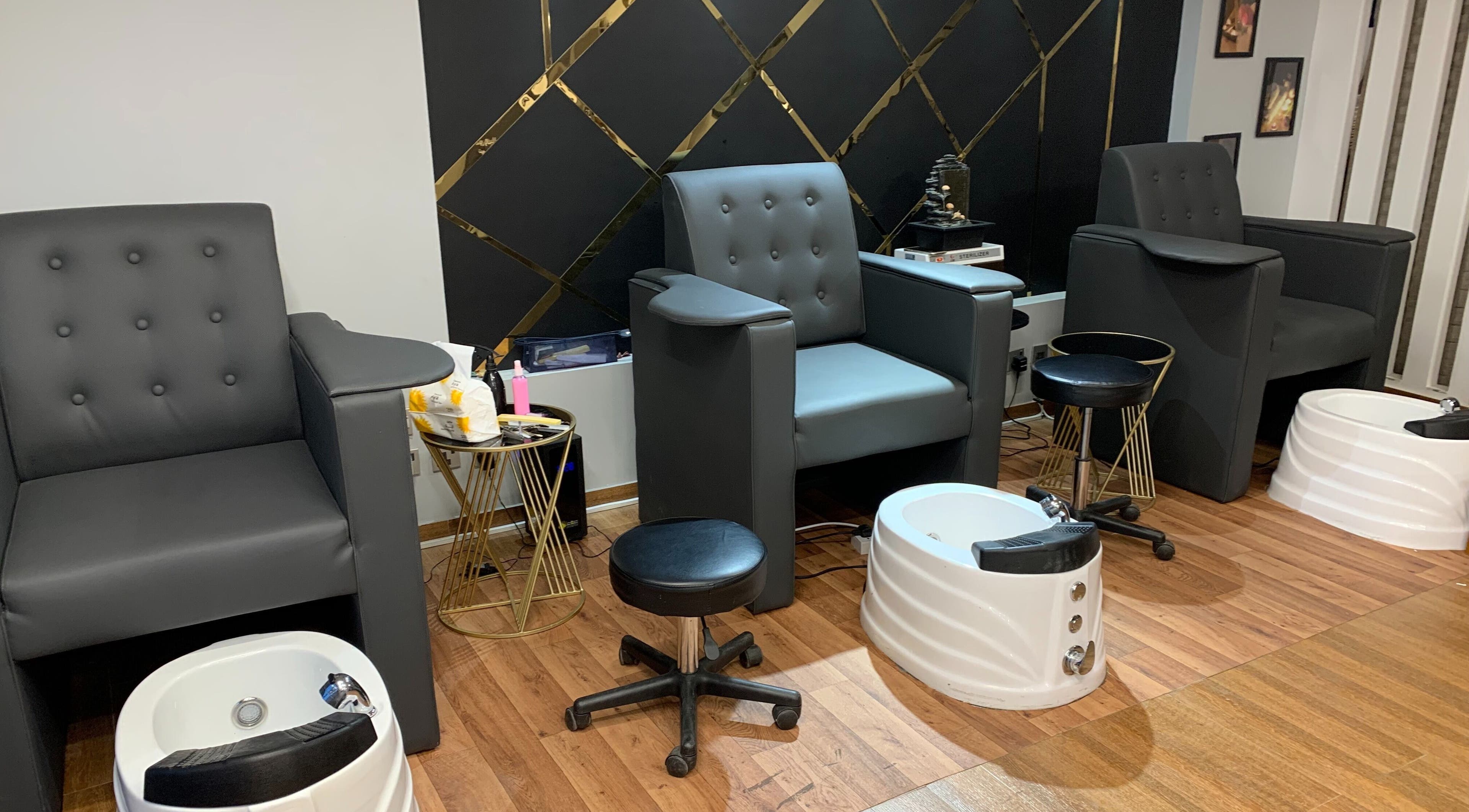 Comfortable pedicure chairs at White Bamboo in Jeddah, Makkah Province, SA showcasing luxury and style.