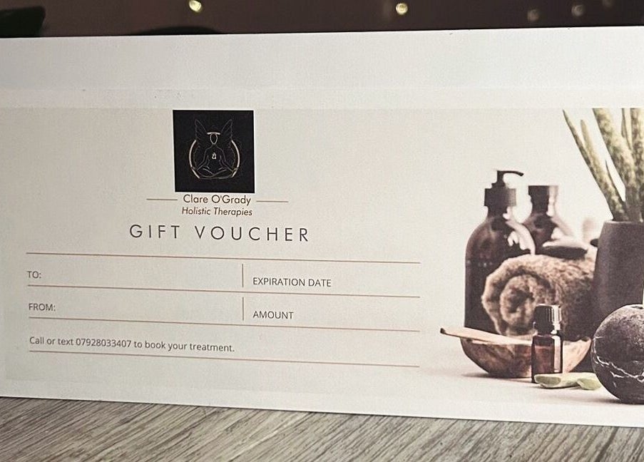 Clare O'Grady Holistic Therapies gift voucher in Hyde, England, GB, displayed with spa essentials.