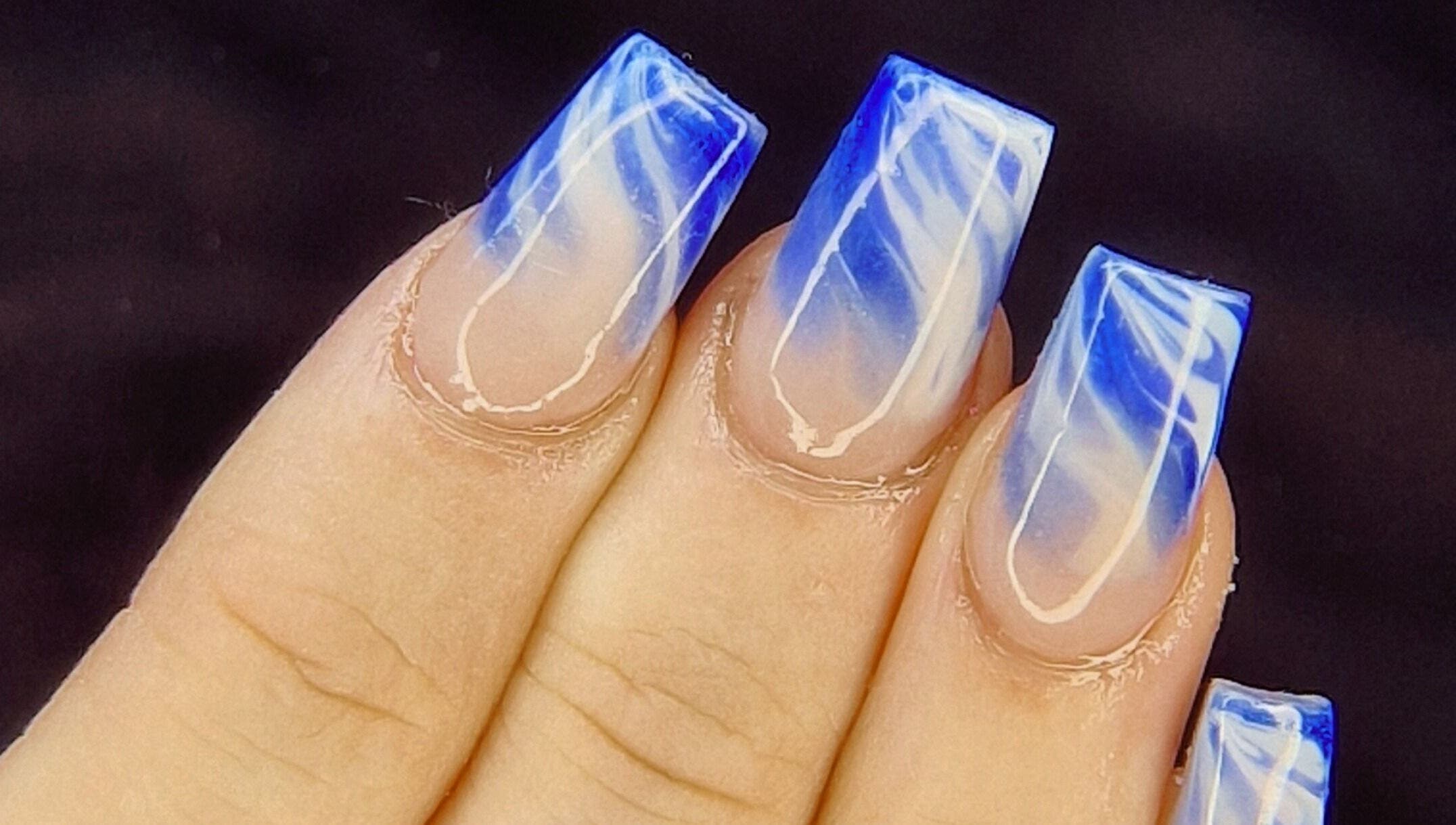 Blue marble nails at Nails by Louise, Barnsley, England, GB showcasing creative nail art.