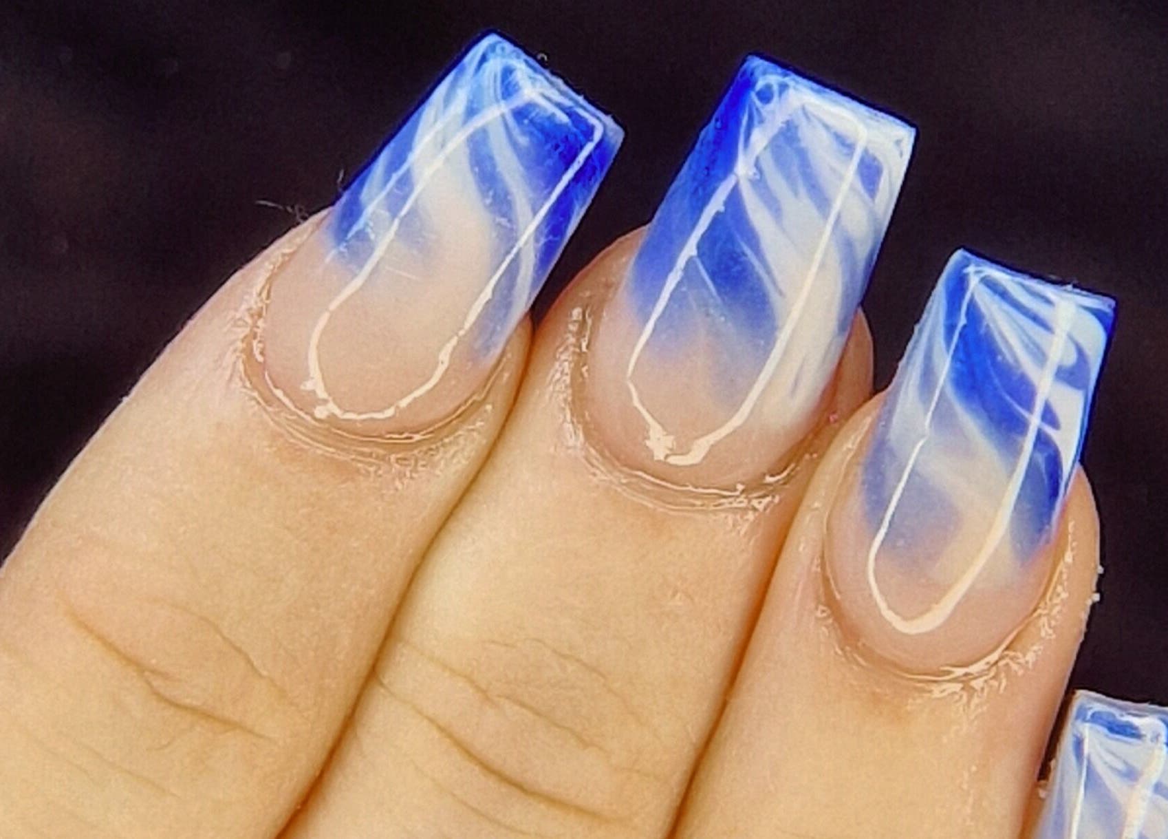 Blue marble nails at Nails by Louise, Barnsley, England, GB showcasing creative nail art.