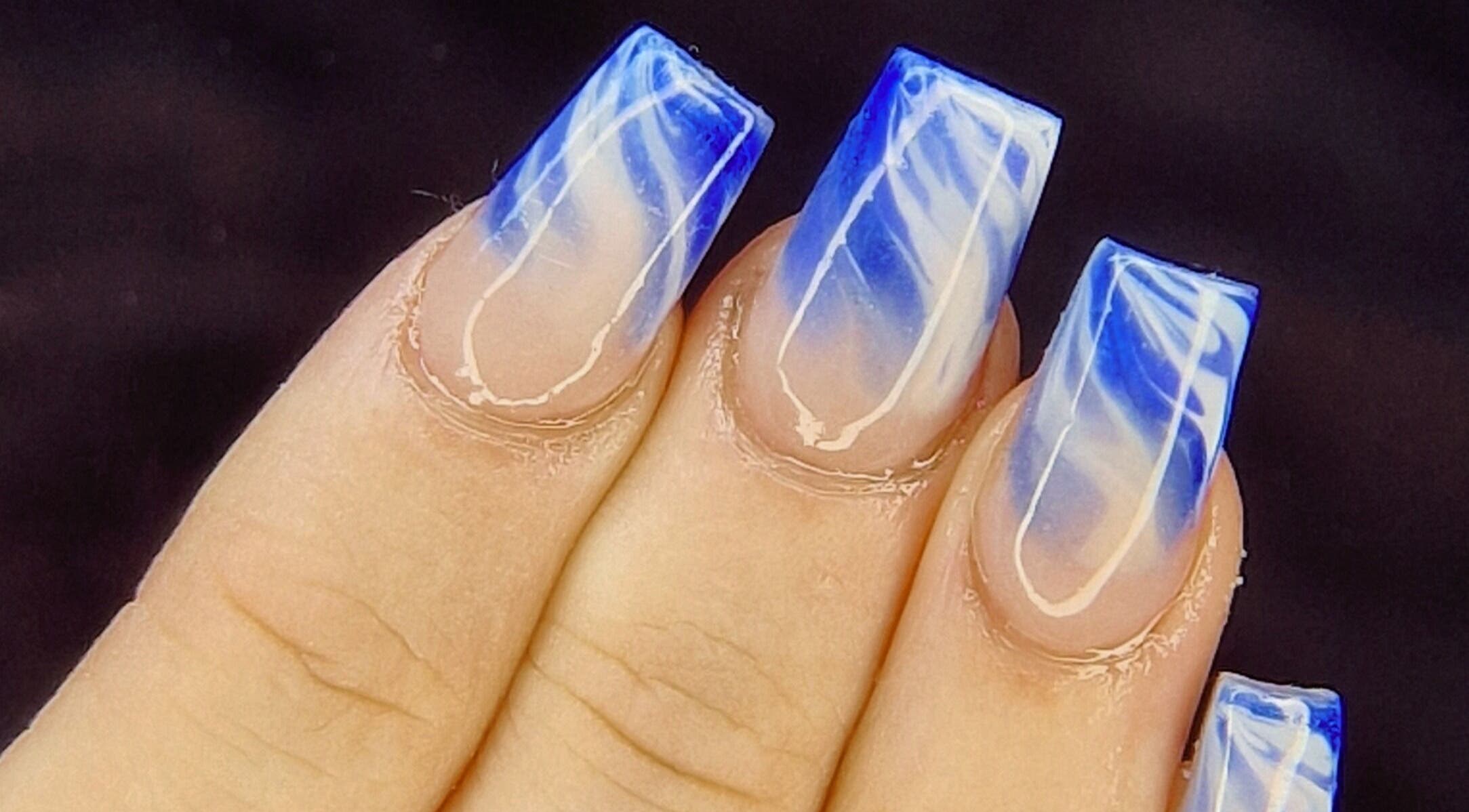 Blue marble nails at Nails by Louise, Barnsley, England, GB showcasing creative nail art.