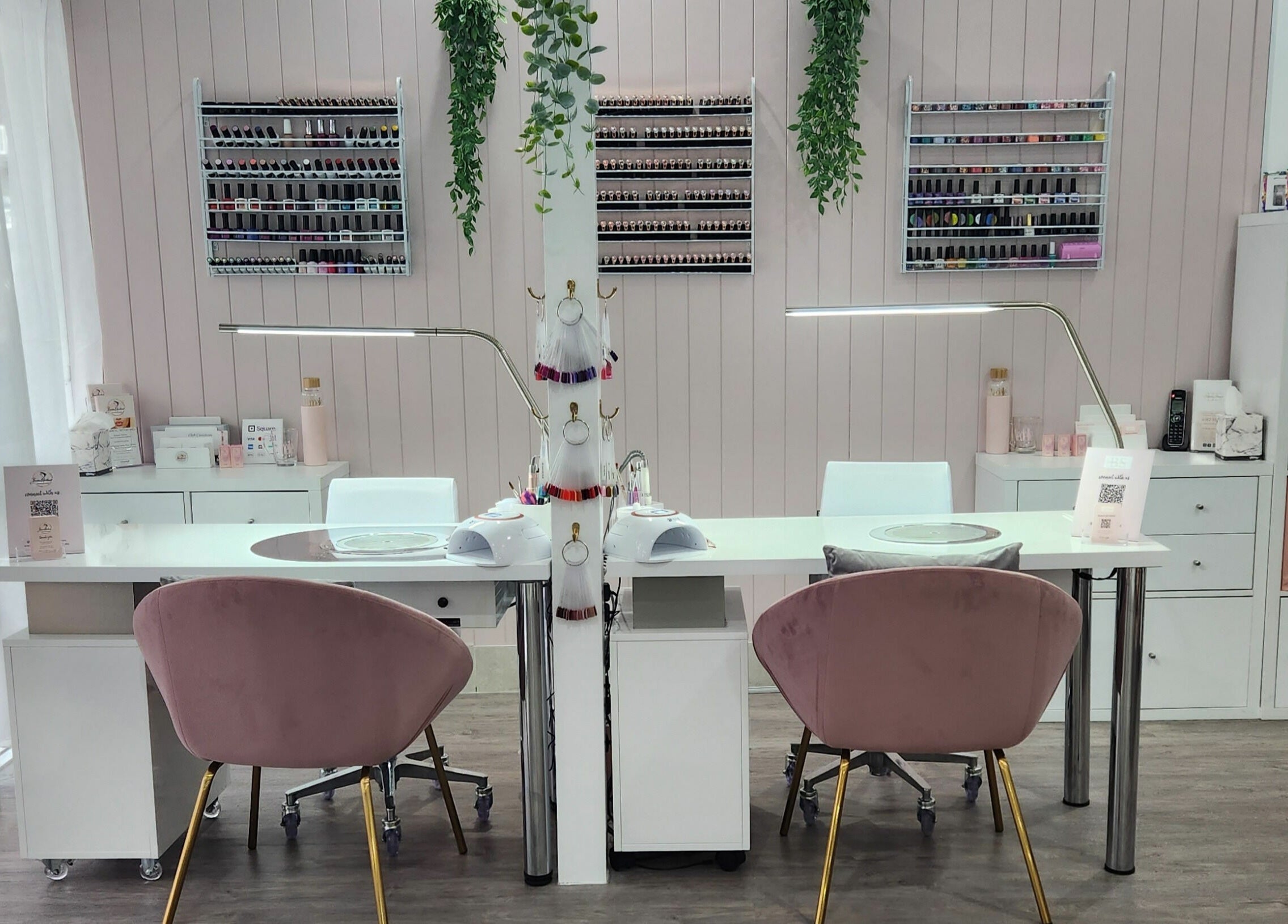 Modern nail studio at Beauty Studio 2 Triple 4, Port Macquarie, New South Wales, AU with plush chairs and polish displays.