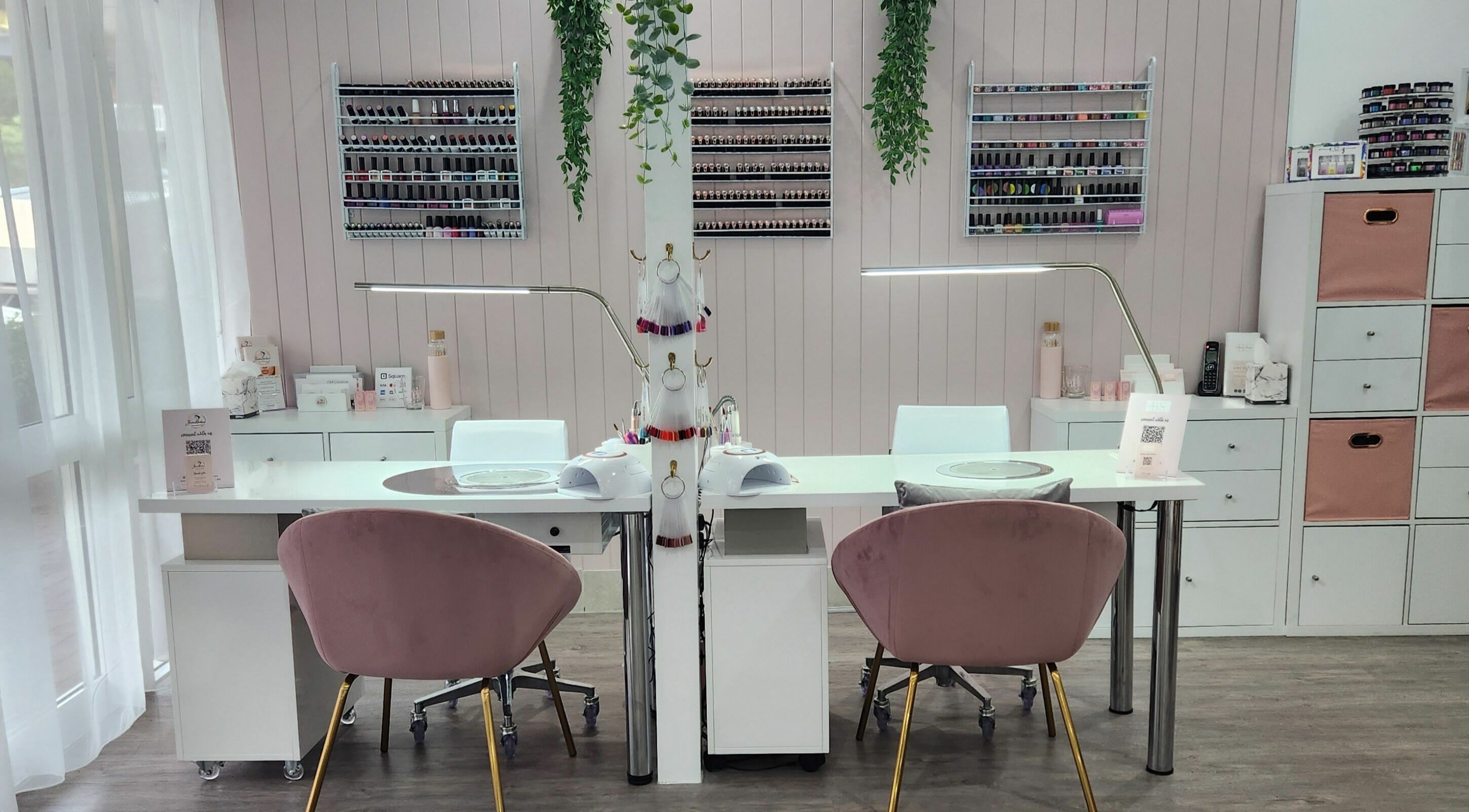 Modern nail studio at Beauty Studio 2 Triple 4, Port Macquarie, New South Wales, AU with plush chairs and polish displays.