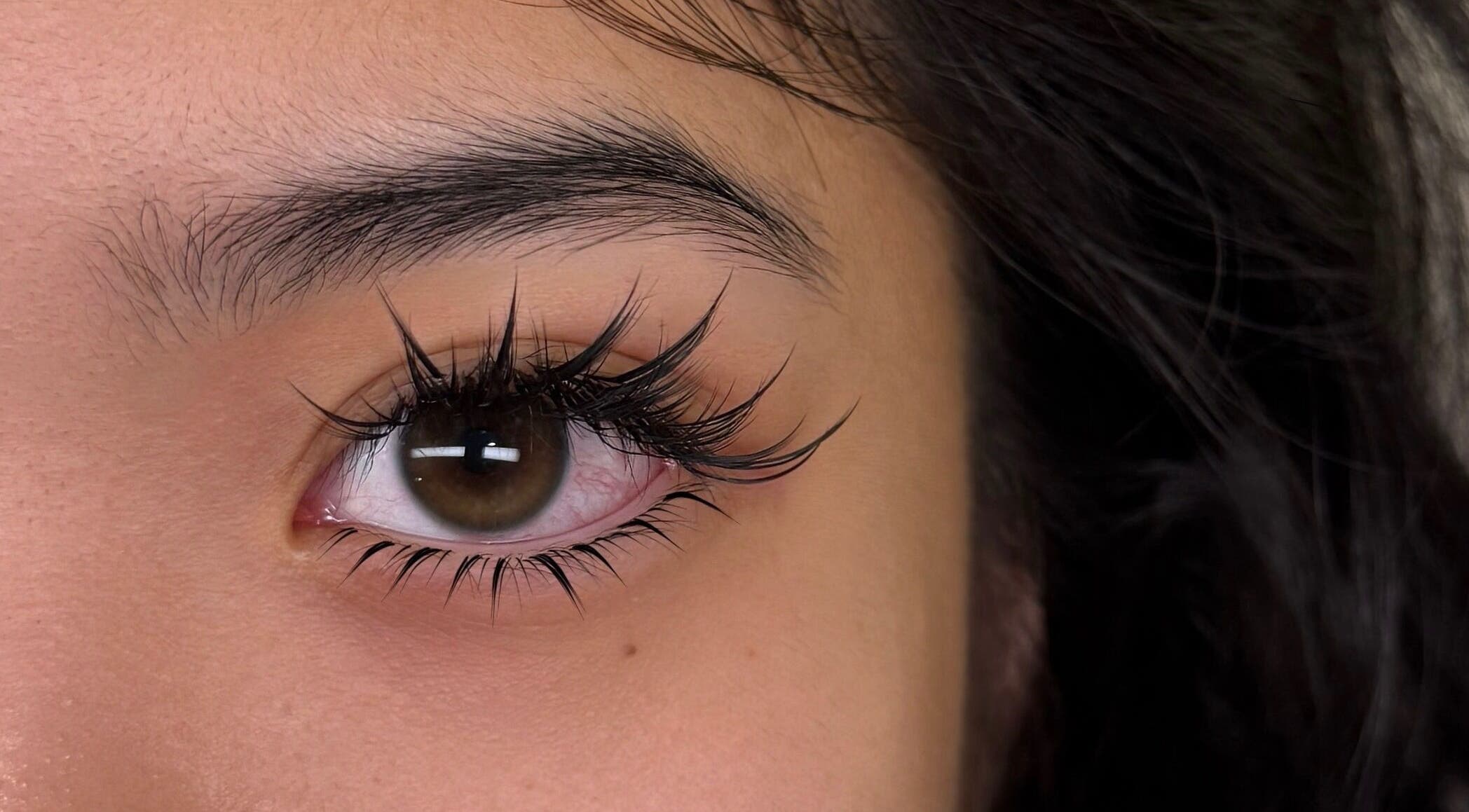 Close-up of eyelash extensions at Lash Fame Beauty in Calgary, Alberta, CA, showcasing elegant lash artistry.