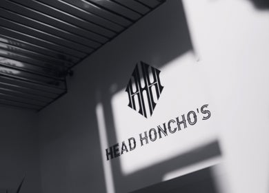 Elegant interior at Head Honcho's Barbershop/Salon, Newton Abbot, England, GB, showcasing modern design.