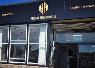 Front view of Head Honcho's Barbershop/Salon in Newton Abbot, England, GB.