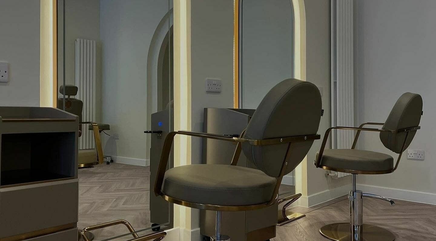 Sleek salon chairs at Soho Seven, Glasgow, Scotland, GB showcasing modern elegance.