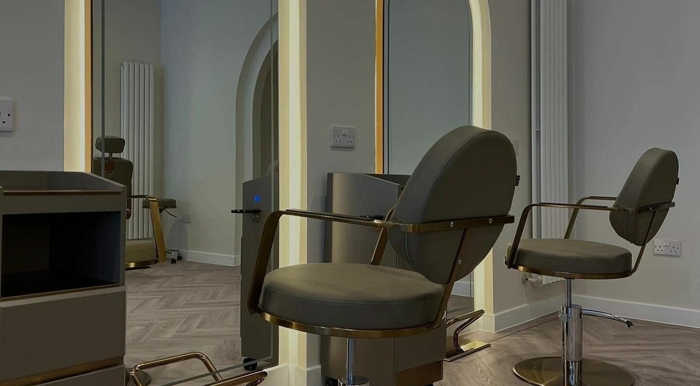Sleek salon chairs at Soho Seven, Glasgow, Scotland, GB showcasing modern elegance.
