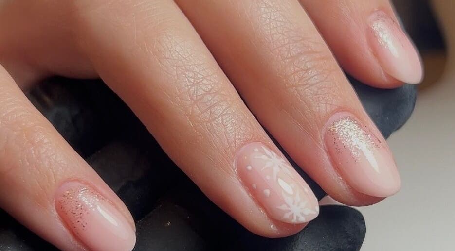 Delicate nail art with glitter at TW Beauty and Nails, Milford Haven, Wales, GB.