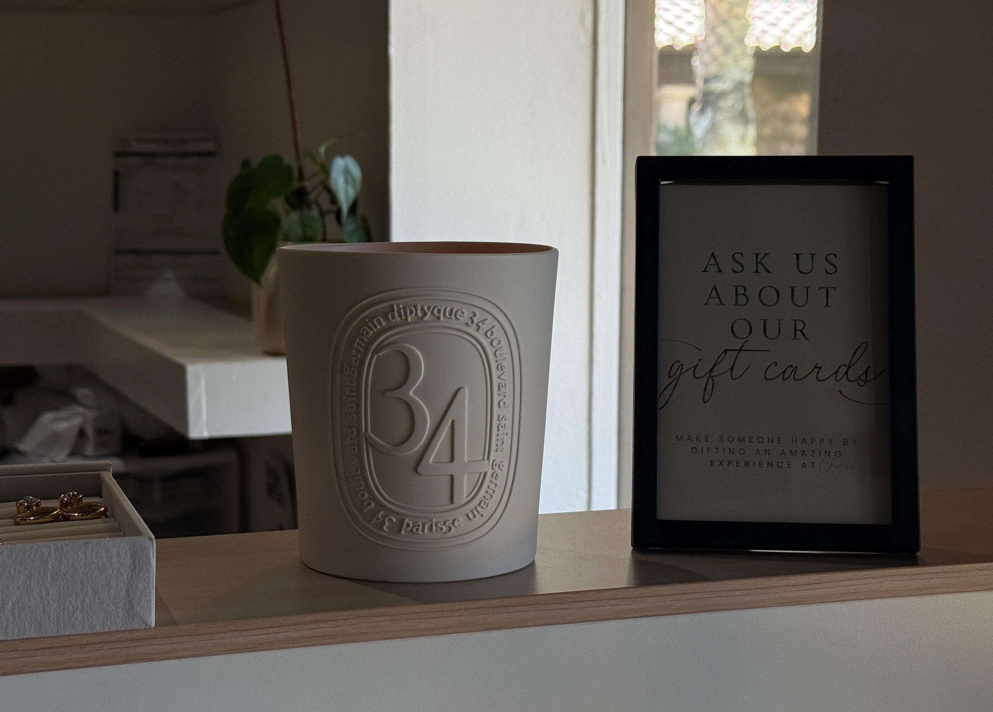 Chéri Nails and Spa in El Paso, Texas, US features a chic gift card display with elegant decor.