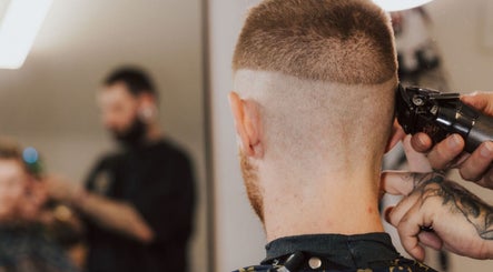Barber giving a buzzcut at Anarchy Barber Shop in Logan Reserve, Queensland, AU.