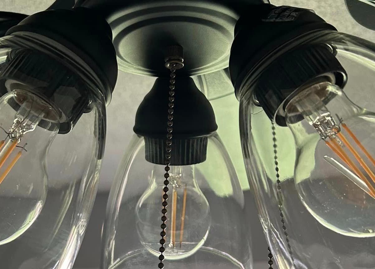 Stylish vintage light fixture at Southern Charm the Cleaning Co, Gilmer, Texas, US.