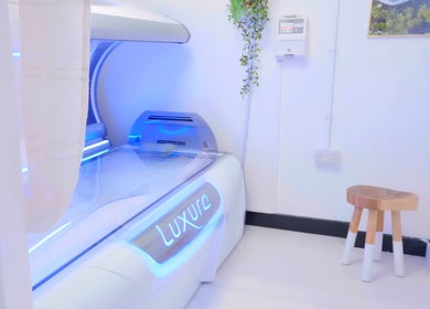 Luxura tanning bed at Golden Tanning Studio, Wadebridge, England, GB, featuring sleek design and inviting ambiance.