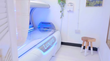 Luxura tanning bed at Golden Tanning Studio, Wadebridge, England, GB, featuring sleek design and inviting ambiance.