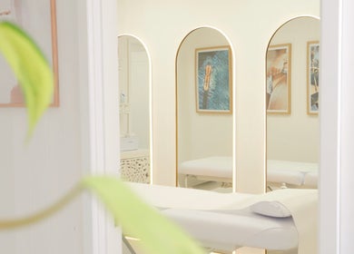 Elegantly designed room at Golden Tanning Studio, Wadebridge, England, GB, featuring warm lighting and chic decor.