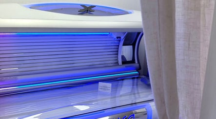 Close-up of sunbed at Golden Tanning Studio, Bude, England, GB, offering a relaxing tanning experience.
