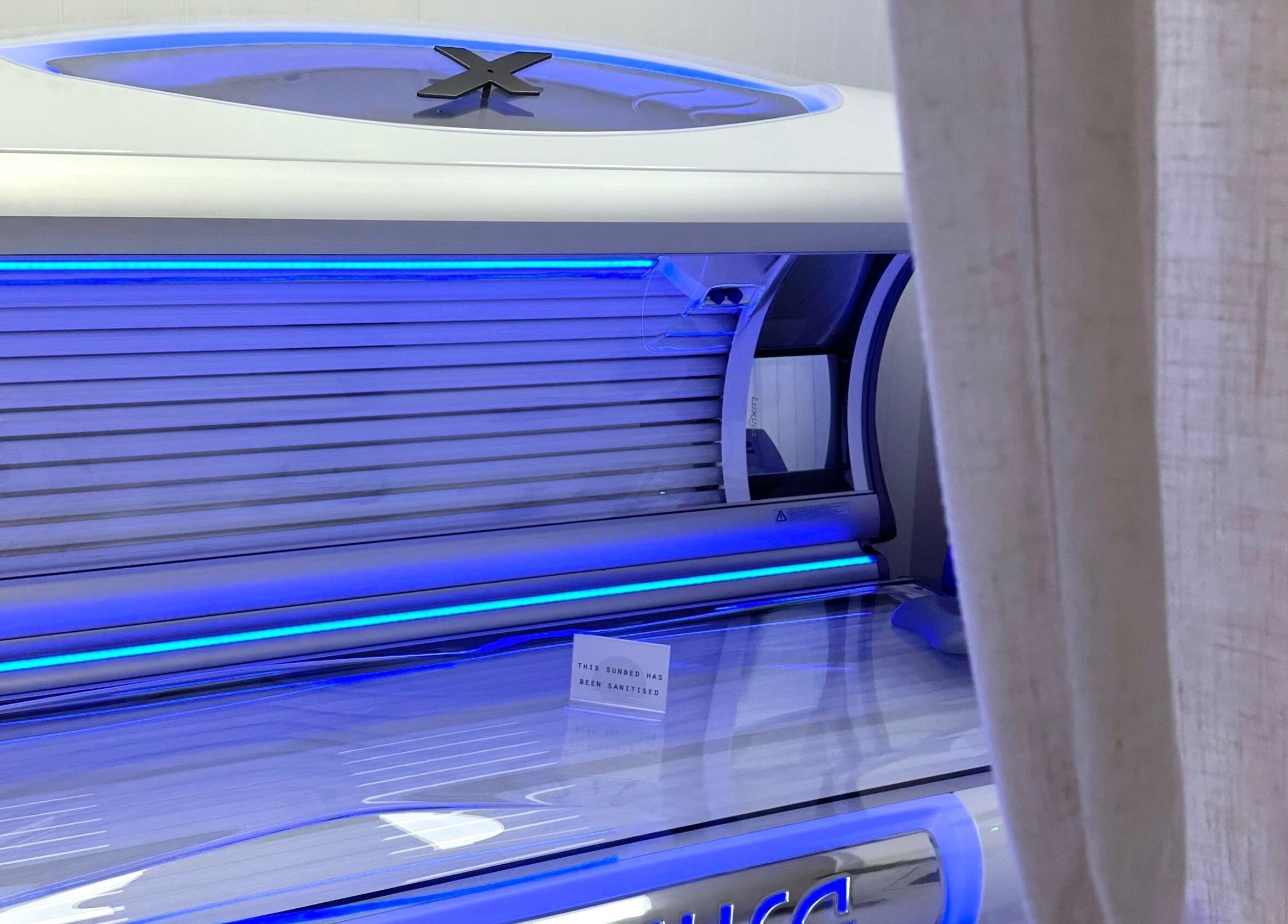 Modern sunbed at Golden Tanning Studio, Bude in Bude, England, GB, showcasing advanced tanning technology.