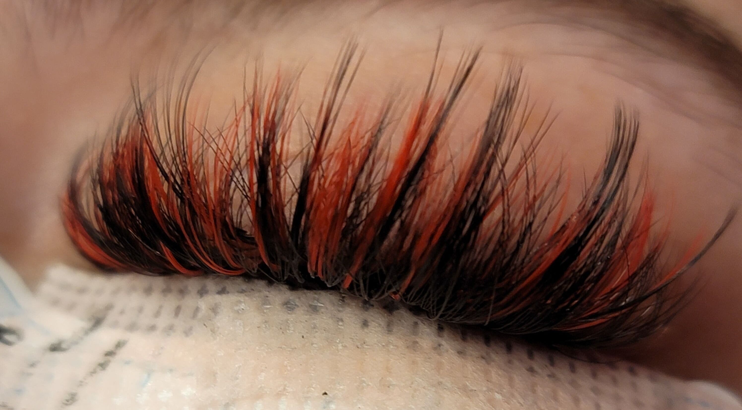 Close-up of colorful lash extensions at LARENEGADE Lashes Aesthetics Wellness Guelph/Puslinch, Guelph, Ontario, CA.