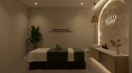 Peaceful spa room with a massage bed at LOAM Wellness & Spa, Las Vegas, Nevada, US.