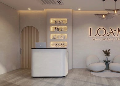 Elegant reception area of LOAM Wellness & Spa in Las Vegas, Nevada, US, featuring modern decor and serene ambiance.