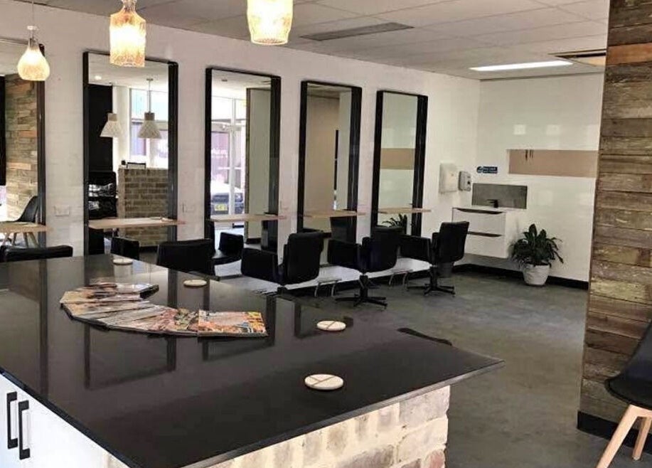 Modern salon interior at Blondes & Blowouts Tuggerah, Tuggerah, New South Wales, AU with chic decor.