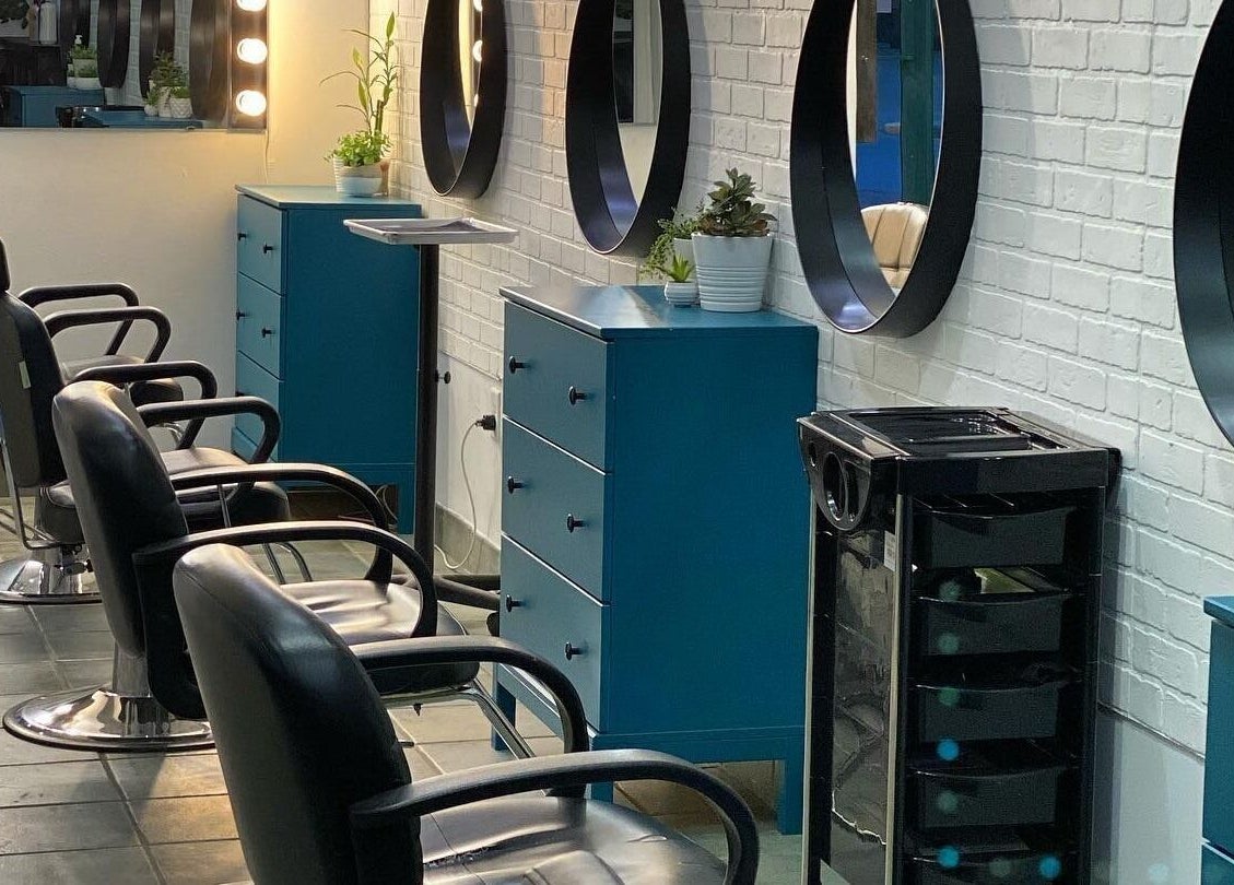 Stylish salon chairs and mirrors at The Brandy Alexander, Whitby, Ontario, CA.
