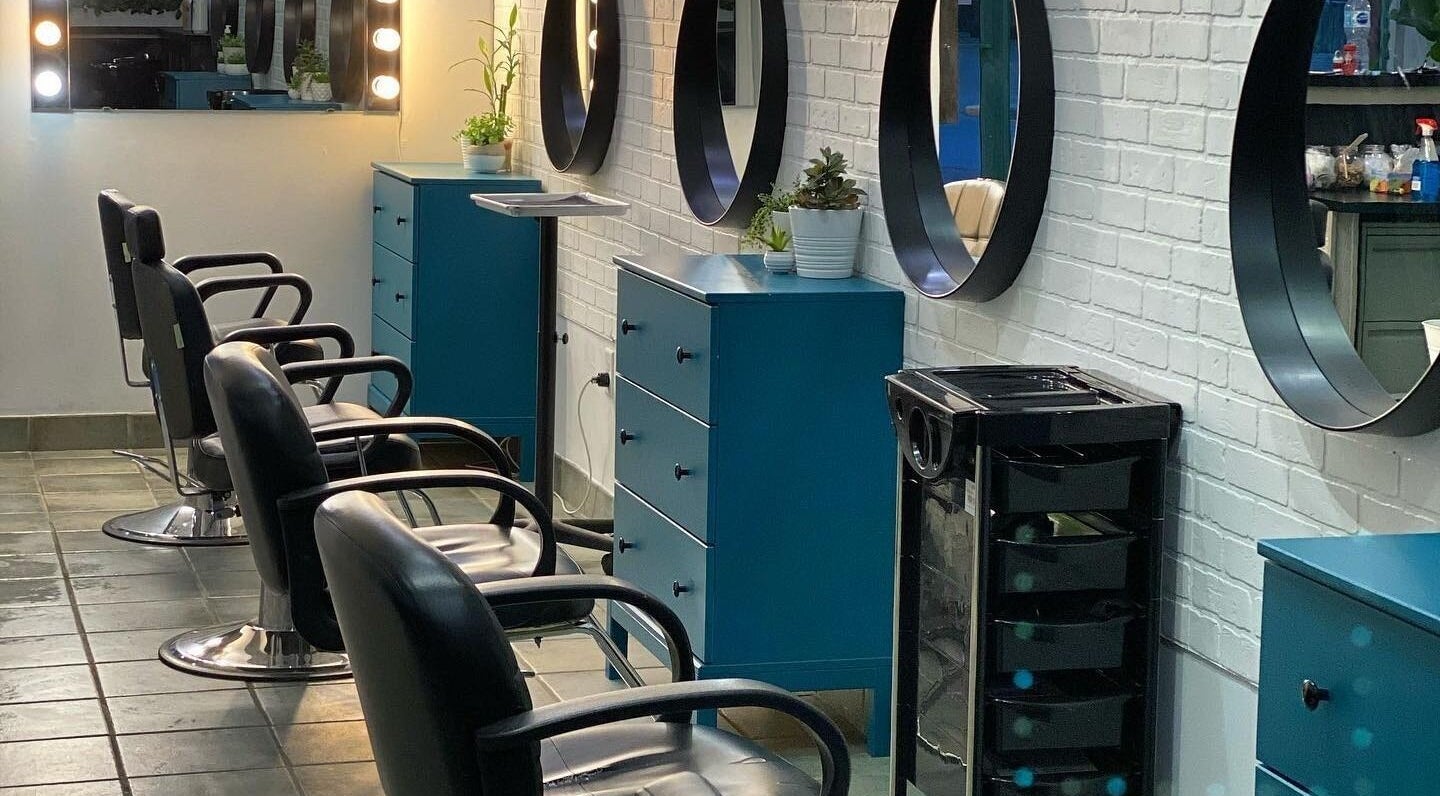 Stylish salon chairs and mirrors at The Brandy Alexander, Whitby, Ontario, CA.