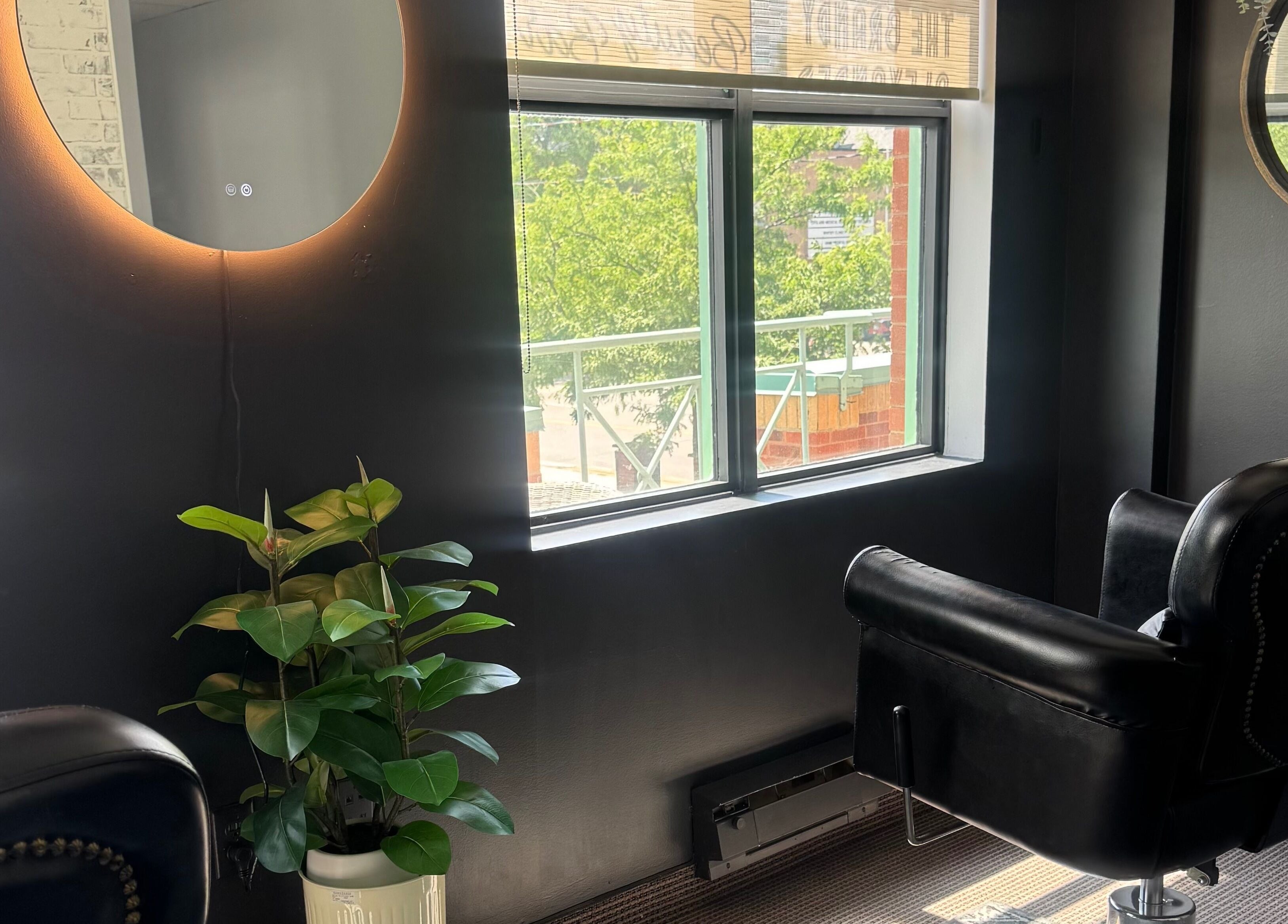 Chic salon view at The Brandy Alexander in Whitby, Ontario, CA with modern decor and natural light.