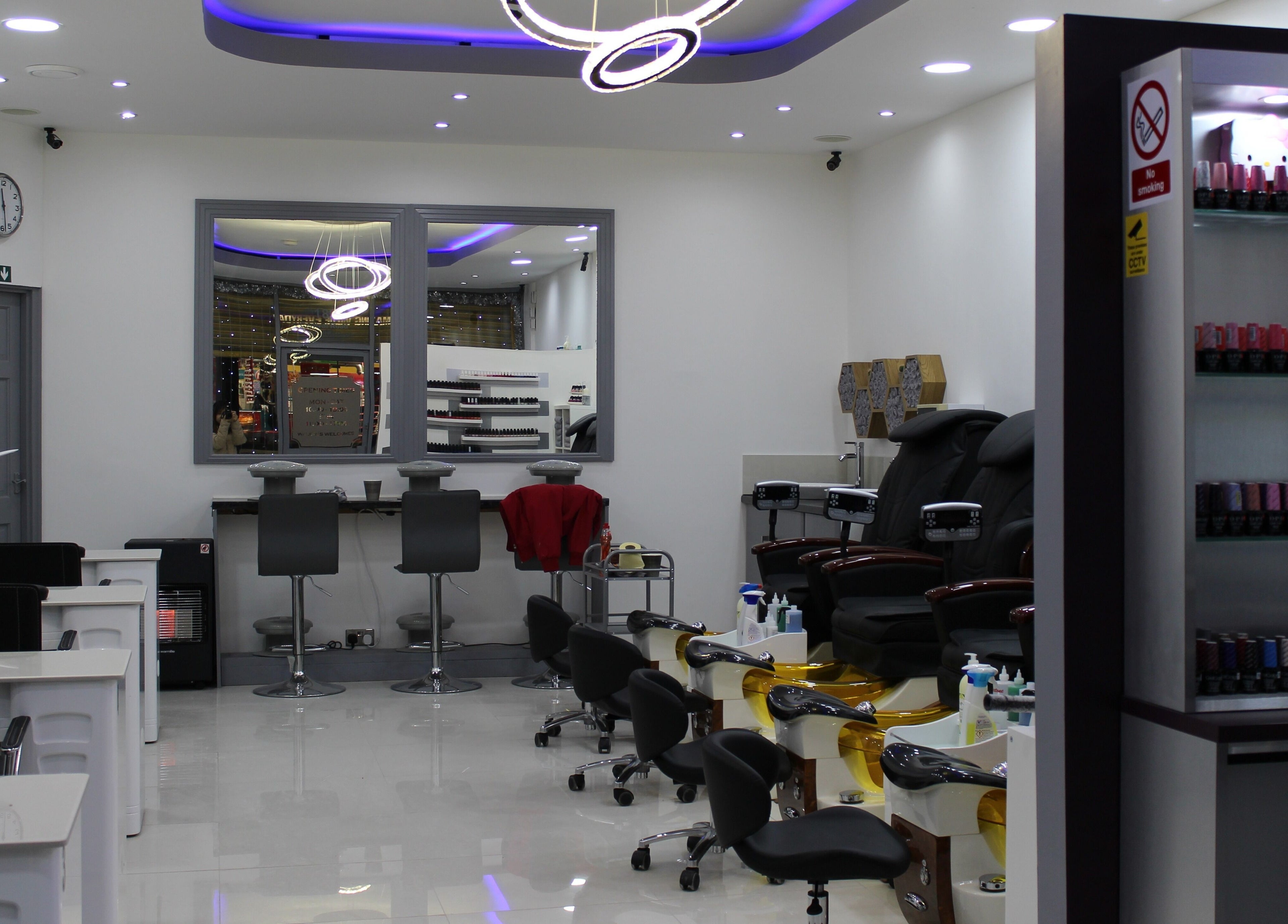 Interior of Angeline Nails & Beauty Worcester Park in Worcester Park, England, GB featuring nail stations.