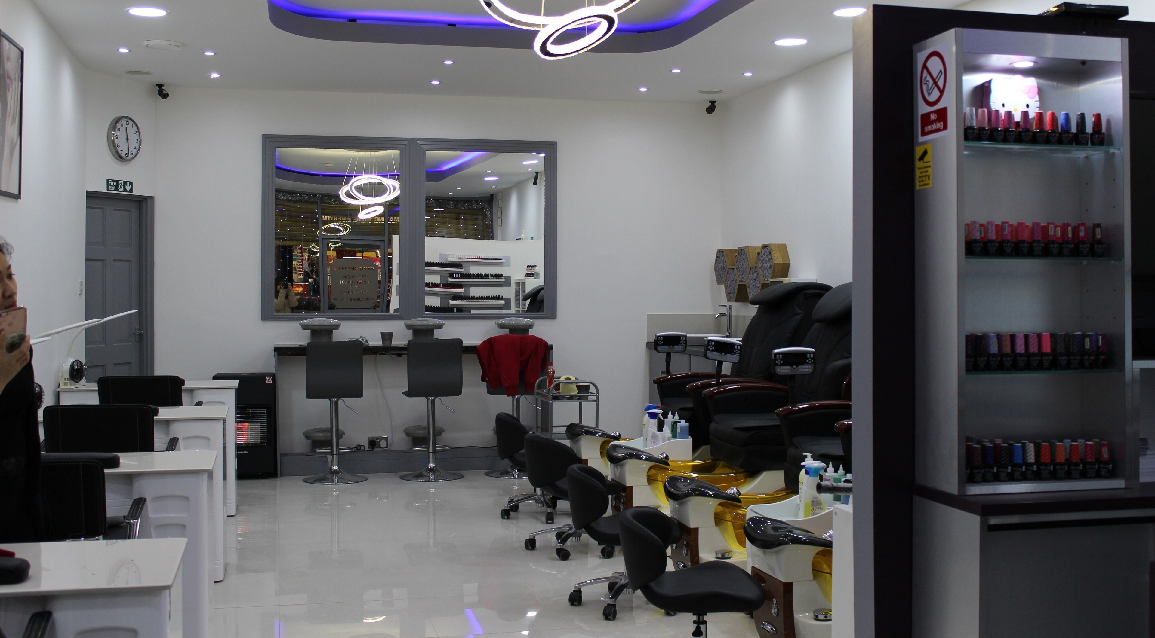 Interior of Angeline Nails & Beauty Worcester Park in Worcester Park, England, GB featuring nail stations.