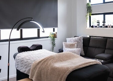 Relaxing spa room at Flutter Your Lashes, Redland Bay, Queensland, AU offering a cozy, serene atmosphere.