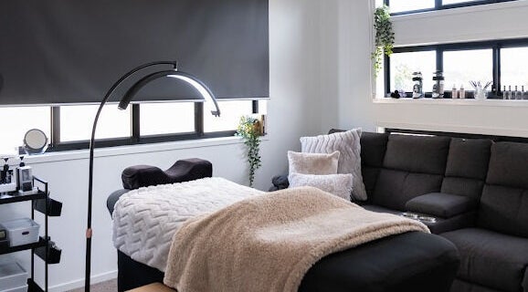 Relaxing spa room at Flutter Your Lashes, Redland Bay, Queensland, AU offering a cozy, serene atmosphere.