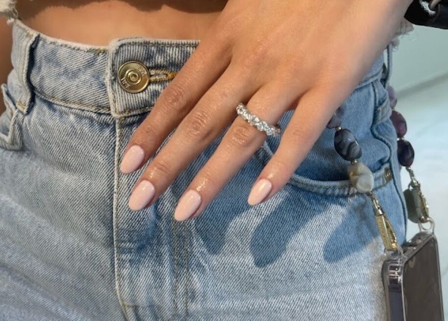 Elegant manicure with light pink nails at Gloss'd Beauty Bar, Amman, Amman Governorate, JO.