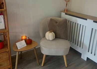 Cozy seating area with knit decor at Lash Love Faye, Birkenhead, England, GB.