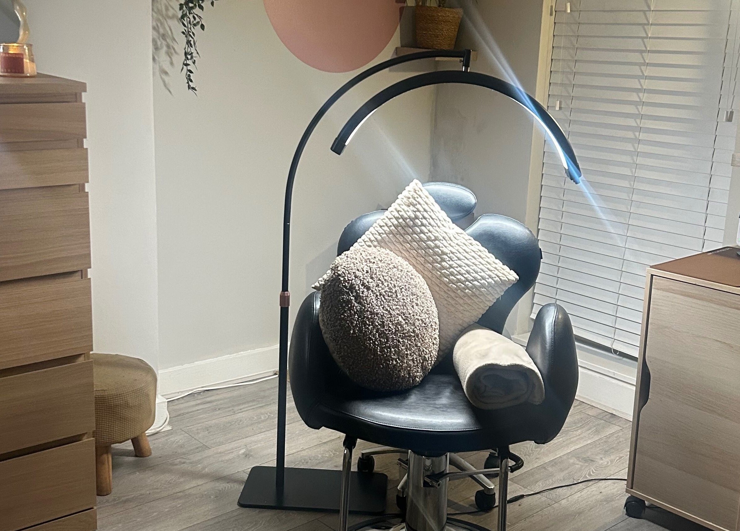 Inviting chair and decor at Lash Love Faye, Birkenhead, England, GB. A perfect beauty treatment space.