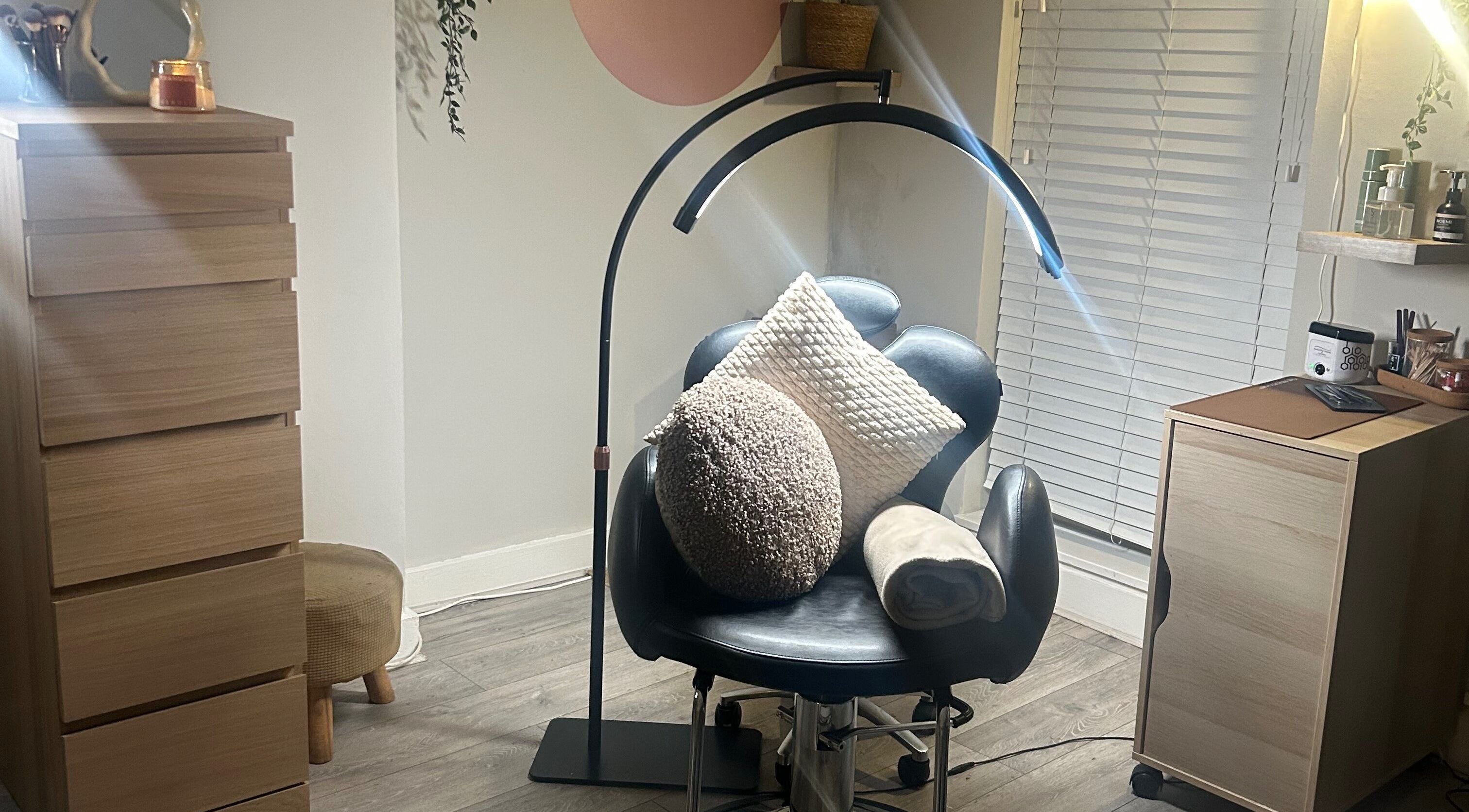 Inviting chair and decor at Lash Love Faye, Birkenhead, England, GB. A perfect beauty treatment space.