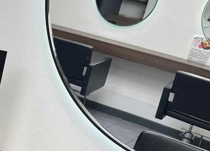 Elegant salon chairs and mirrors at Haven Hair Beauty & Aesthetics in Coventry, England, GB.