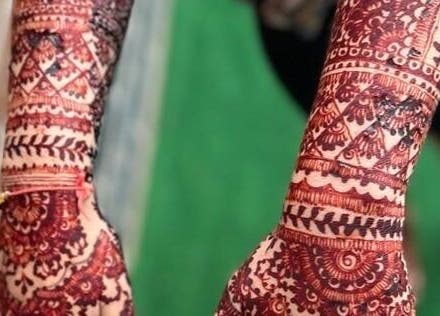 Beautiful henna designs on arms at Haven Hair Beauty & Aesthetics in Coventry, England, GB.