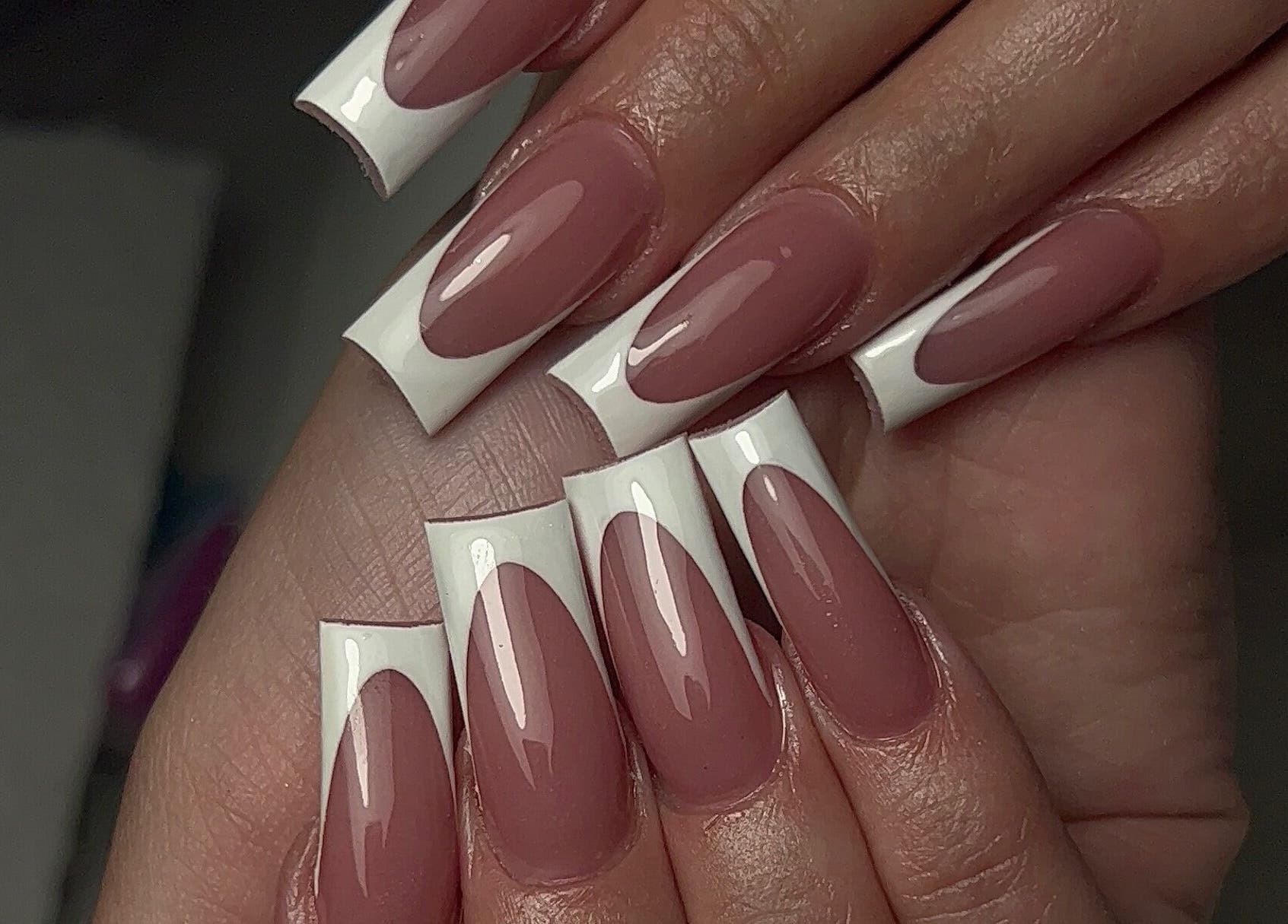 Manicured nails with French tips at DCE Care, Willemstad, Curaçao, CW.