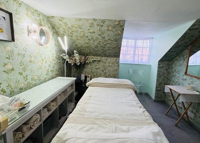Calm treatment room at Pure Face Works at Utopia Hair Salon & Facial Clinic, Sidmouth, England, GB.